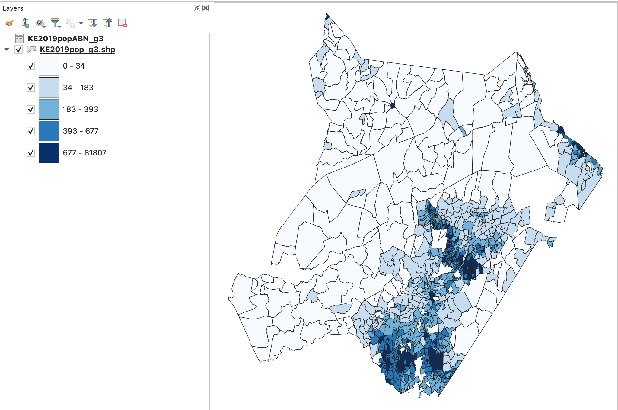 Screenshot of a QGIS map of Kenya displaying the 2019 population density by division. Darker blues indicate higher population density.